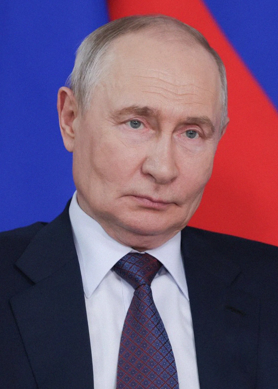 Vladimir Poetin tijdens een overheidsbijeenkomst in Rusland
